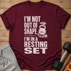 Maroon t-shirt with "I'm not out of shape, I'm in a resting set" text.