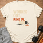 Cream t-shirt with "WORKED OUT. KIND OF." and spilled shaker bottle graphic.