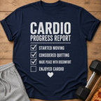 Navy t-shirt with "CARDIO PROGRESS REPORT" and a checklist with checked boxes.