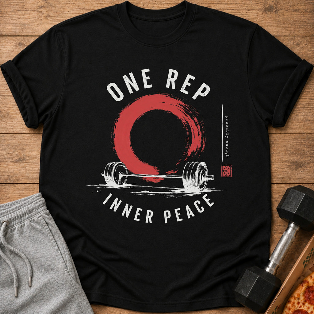 Black t-shirt with barbell, red circle, and "ONE REP INNER PEACE" text.