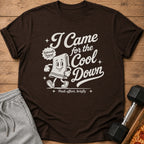 Brown t-shirt with text "I Came for the Cool Down" and cartoon towel graphic.