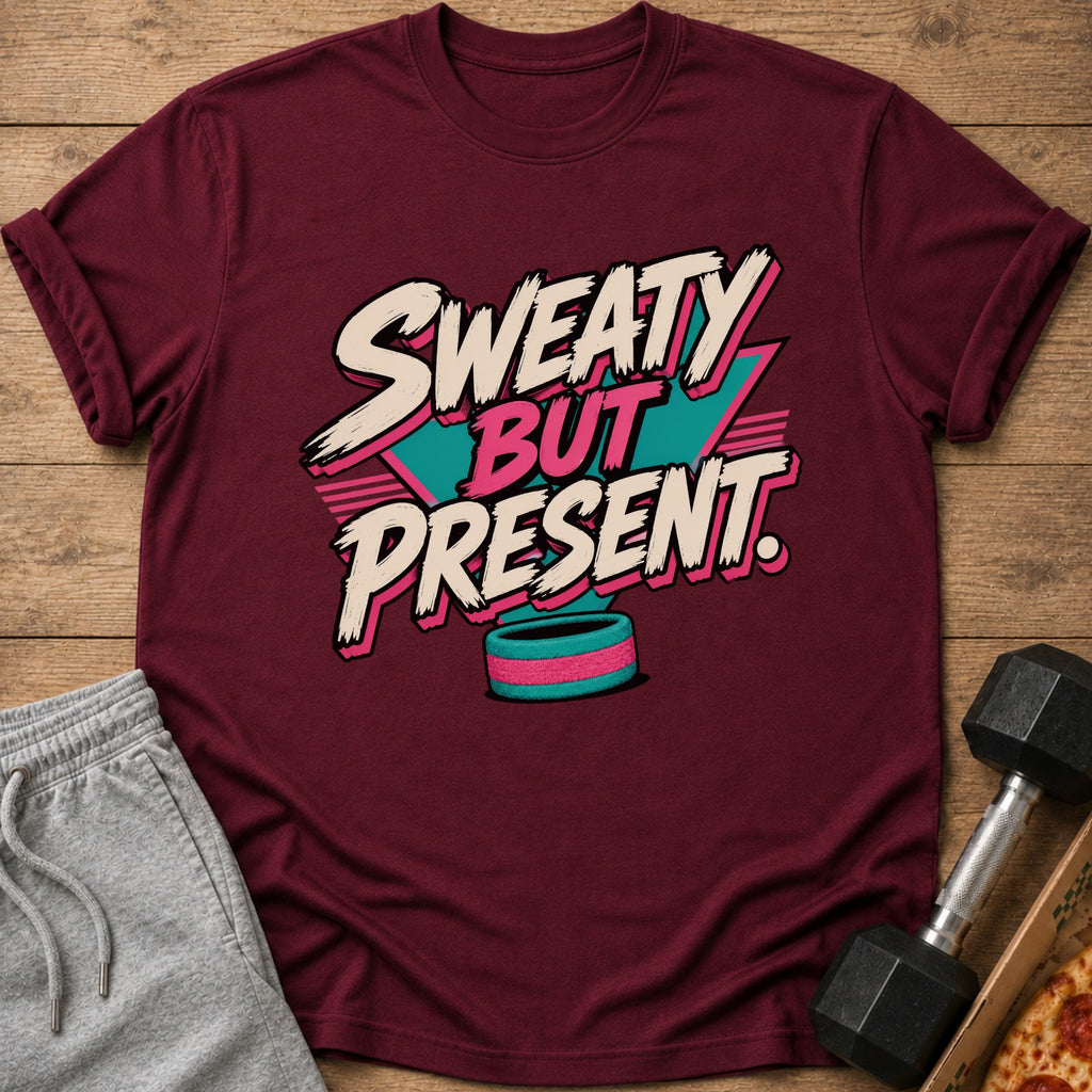 Maroon t-shirt with "SWEATY BUT PRESENT" text and a teal and pink design.