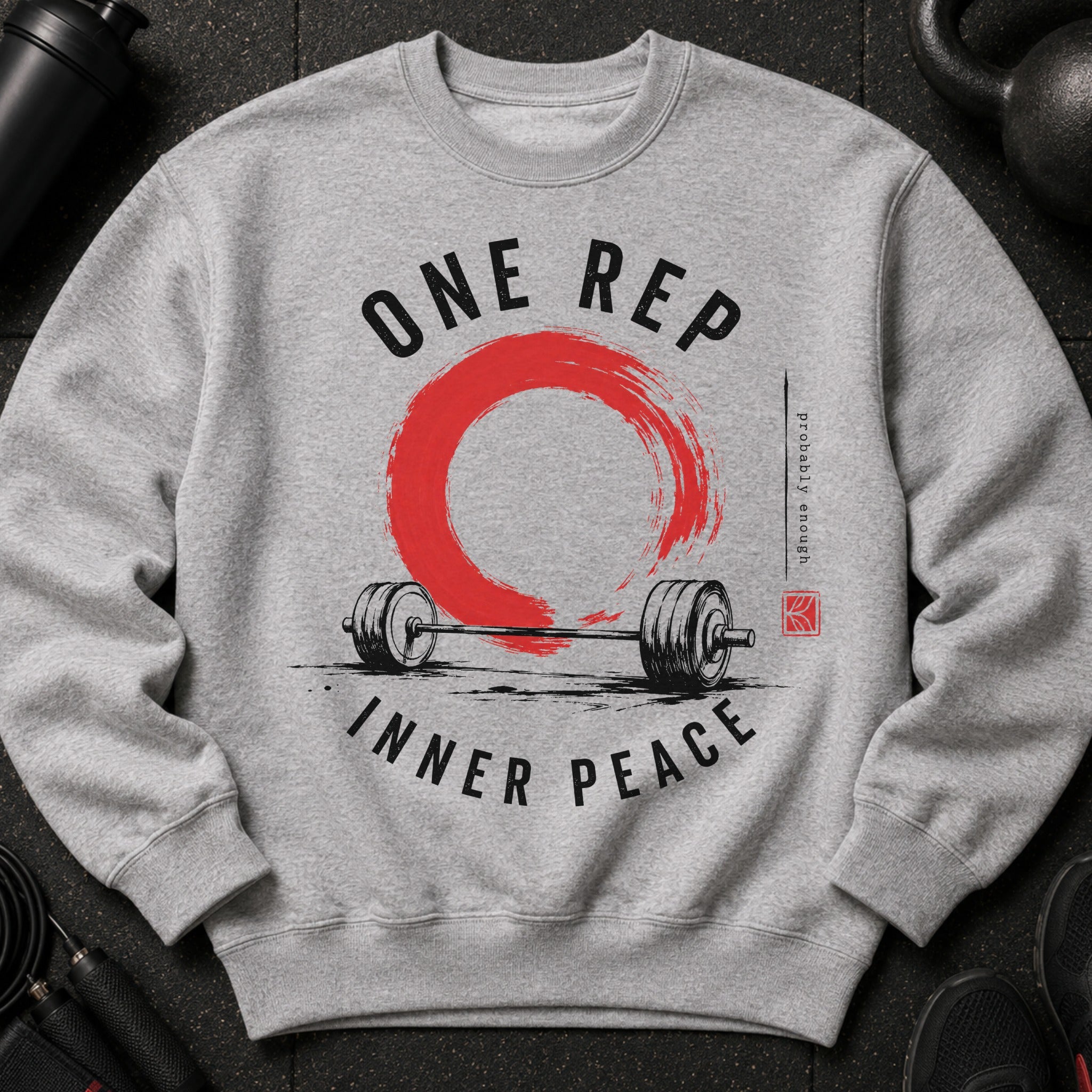Grey sweatshirt with "ONE REP INNER PEACE" text and barbell graphic.