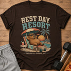 Brown t-shirt with "Rest Day Resort" and a capybara on a beach chair.
