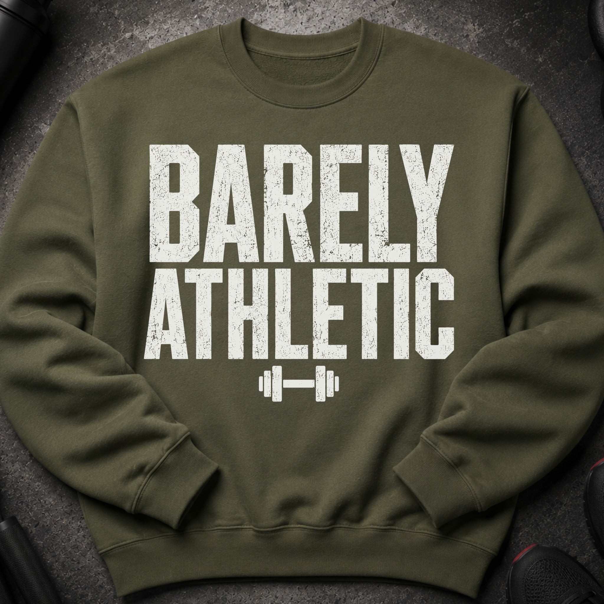 Olive green sweatshirt with white "BARELY ATHLETIC" text and barbell graphic.