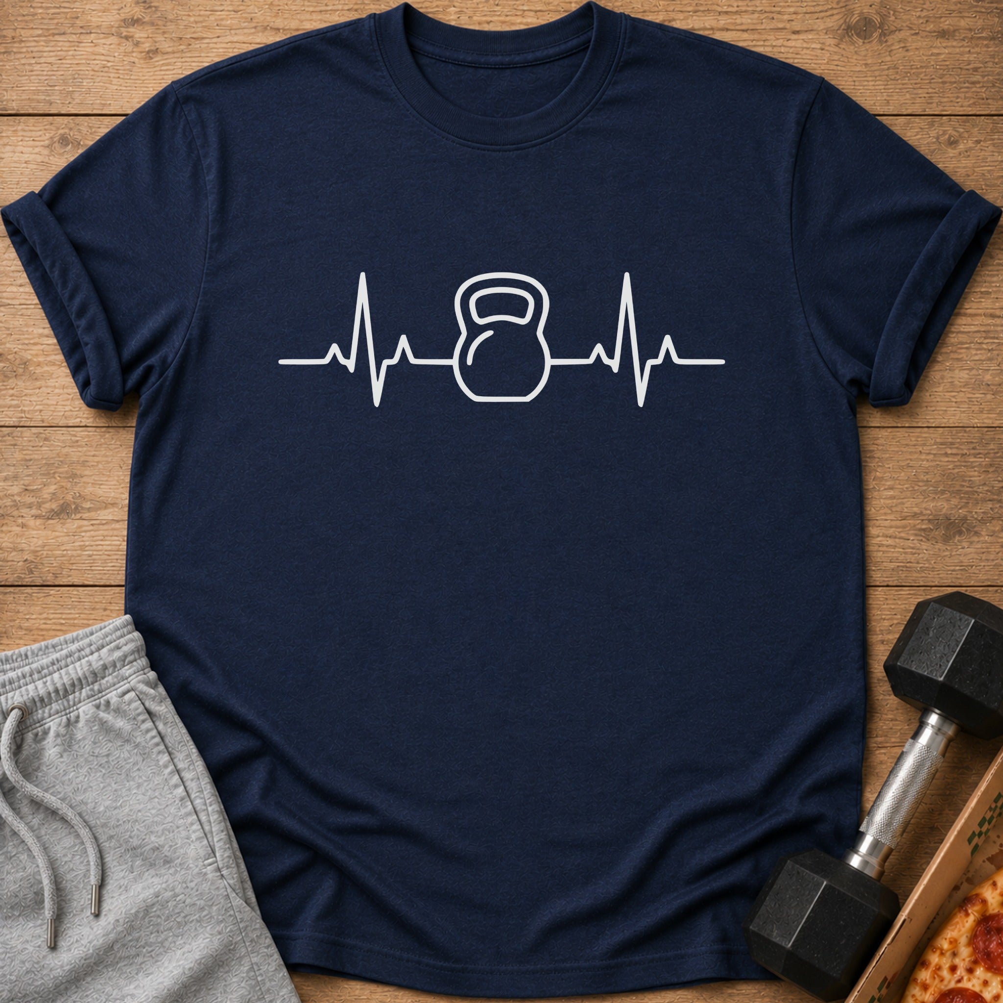 Navy t-shirt with white kettlebell and heartbeat graphic.