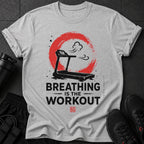 Gray t-shirt with treadmill graphic and "BREATHING IS THE WORKOUT" text.