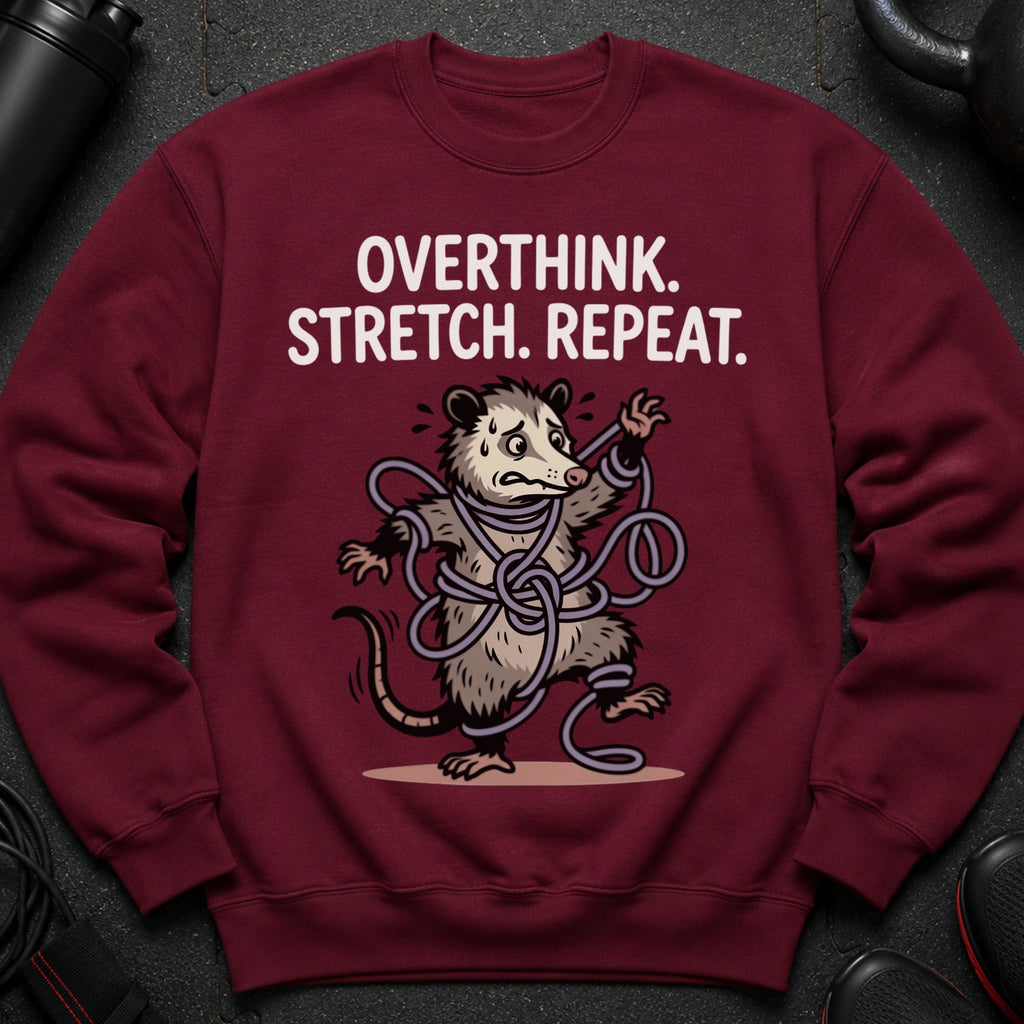 Maroon sweatshirt with a tangled opossum graphic and text that reads "OVERTHINK. STRETCH. REPEAT."