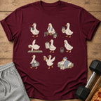 T-shirt with a repeating pattern of cartoon ducks engaged in various fitness activities and resting.