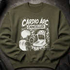 Green sweatshirt with anime-style graphic: "Cardio Arc Cancelled" and a character facing a treadmill.