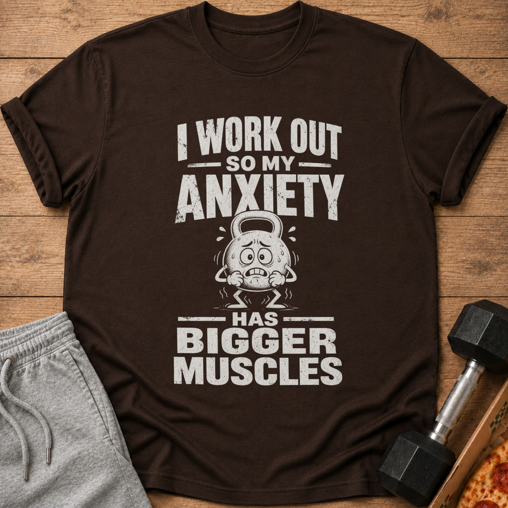 Brown t-shirt with text "I WORK OUT SO MY ANXIETY HAS BIGGER MUSCLES".