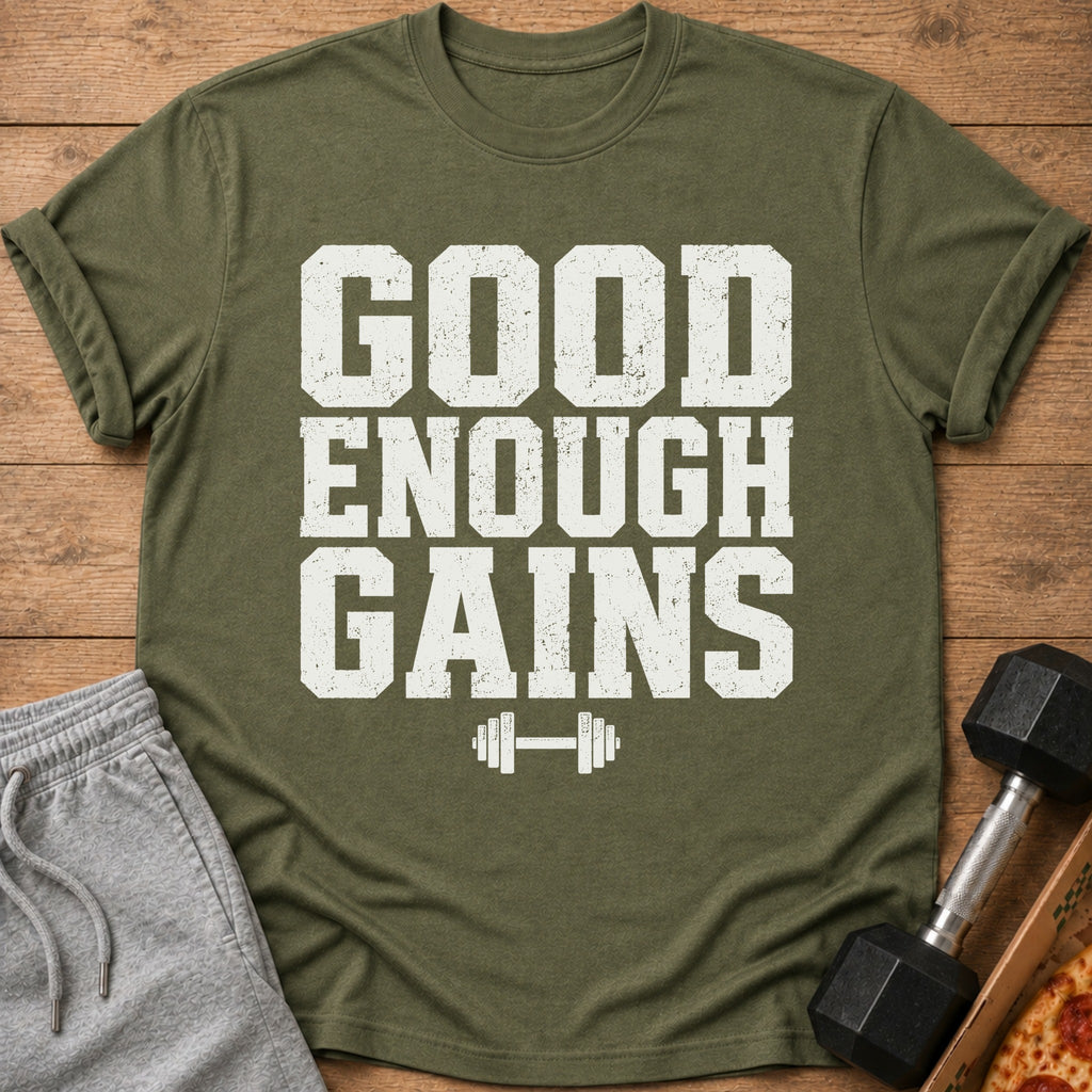 Green t-shirt with white text "GOOD ENOUGH GAINS" and dumbbell graphic.