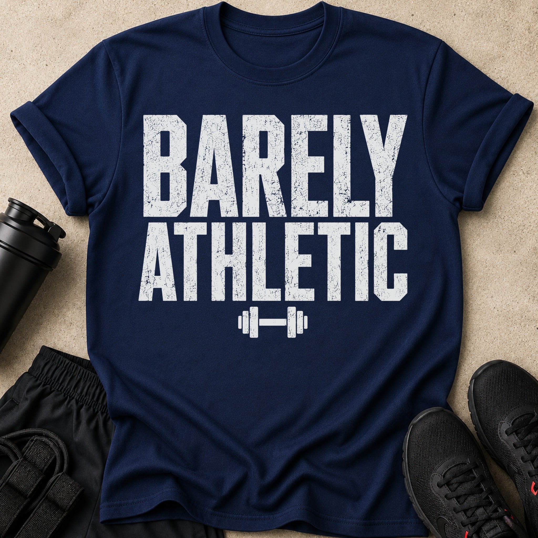 Navy t-shirt with "BARELY ATHLETIC" text and a dumbbell graphic.