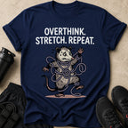 Navy t-shirt with opossum tangled in rope, text reads "OVERTHINK. STRETCH. REPEAT."