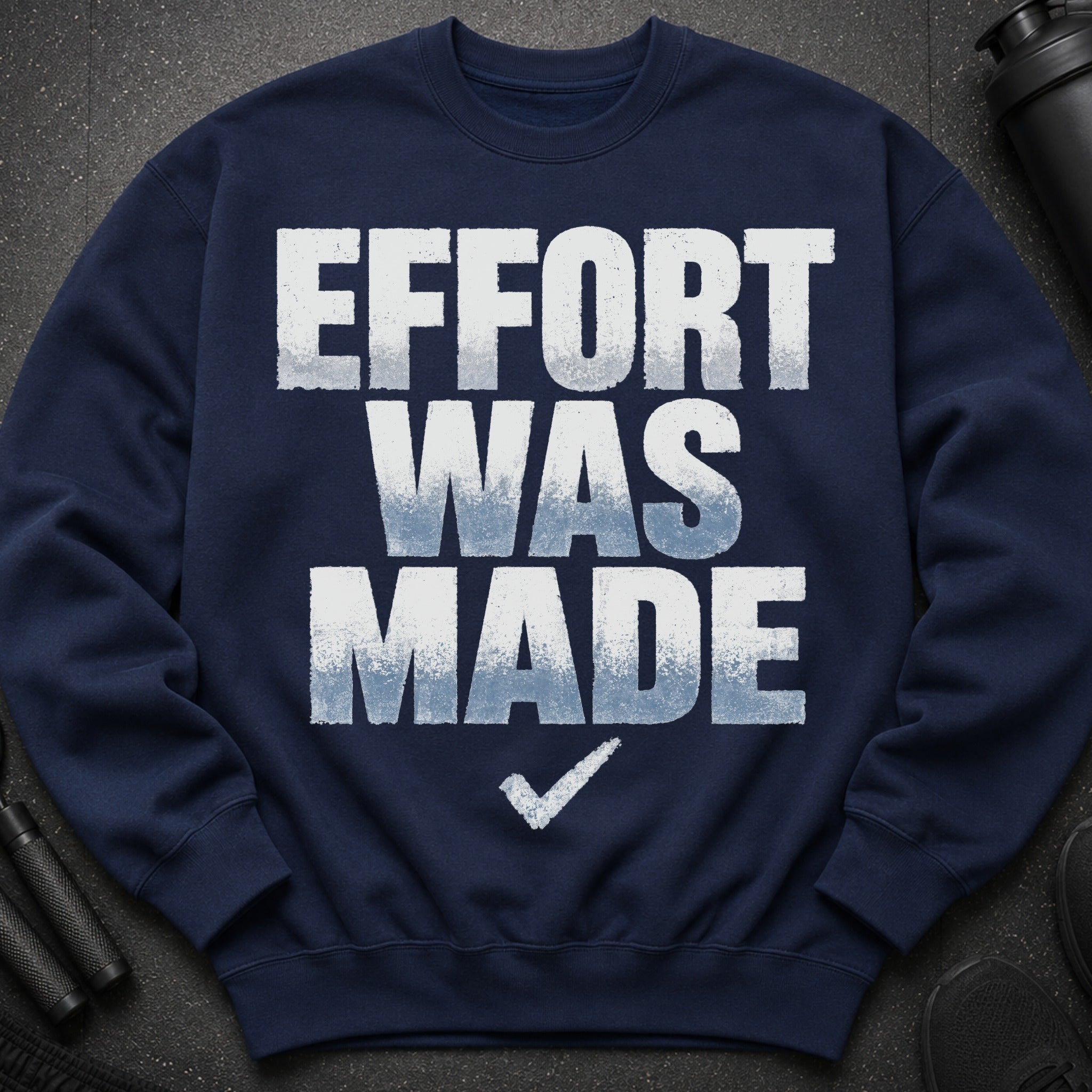 Navy crewneck sweatshirt with "EFFORT WAS MADE" text and a checkmark at the bottom.