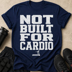 Navy t-shirt with distressed white text reading "NOT BUILT FOR CARDIO" and a treadmill icon.