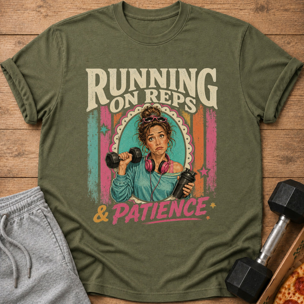 T-shirt graphic with text "Running on Reps & Patience" featuring a woman lifting weights.