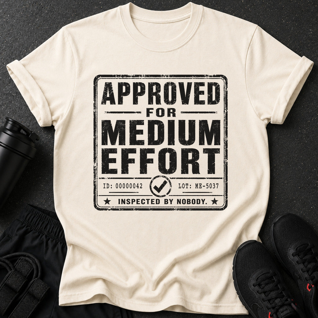 Cream t-shirt with black text "APPROVED FOR MEDIUM EFFORT INSPECTED BY NOBODY".