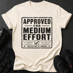 Cream t-shirt with black text "APPROVED FOR MEDIUM EFFORT INSPECTED BY NOBODY".