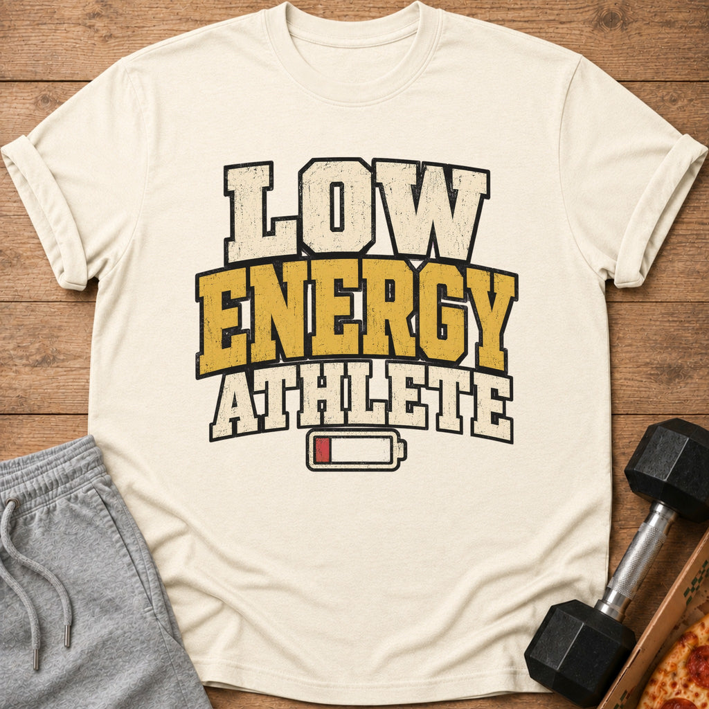 Cream t-shirt with "Low Energy Athlete" text and a low battery symbol.