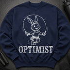 Navy sweatshirt with a white graphic of a rabbit jumping rope and the word "OPTIMIST".