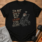 Black t-shirt with sloth exercising and text "I'm not here to be the best. I'm here to feel a little less worst."