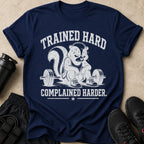 Navy t-shirt with graphic of a skunk sitting by a barbell, text reads "TRAINED HARD COMPLAINED HARDER."