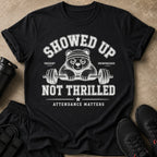 Black t-shirt with a bear lifting weights and text that reads "Showed up, not thrilled."