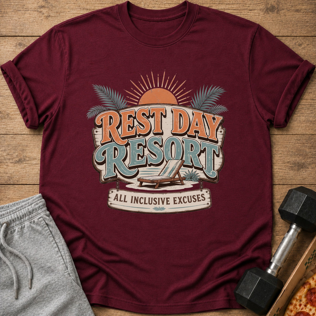 Maroon t-shirt with "Rest Day Resort All Inclusive Excuses" graphic.
