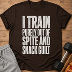 Brown t-shirt featuring the white distressed text I train purely out of spite and snack guilt.