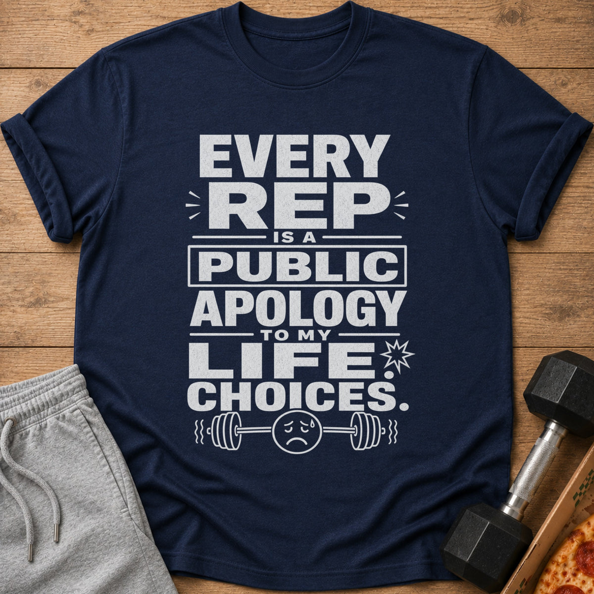 Navy t-shirt with white text: "Every Rep Is A Public Apology To My Life Choices."