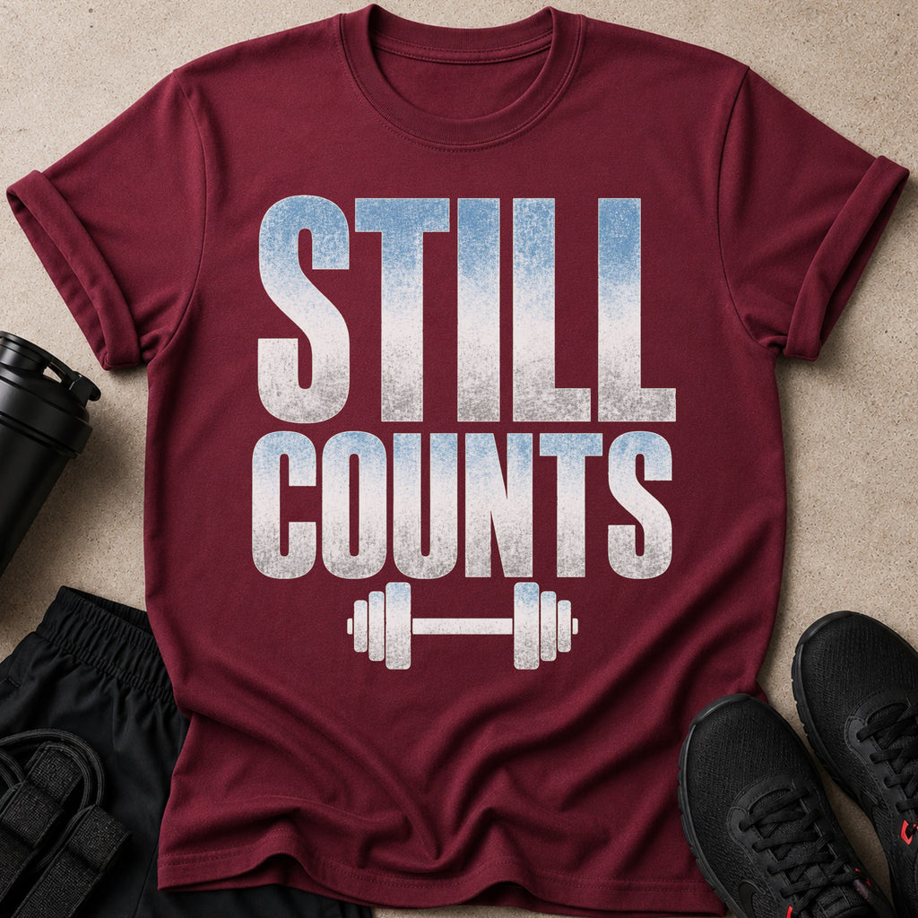Burgundy t-shirt with white distressed text and barbell graphic.