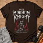 Brown t-shirt with "The Minimum Knight Doing Just Enough" text and knight lifting dumbbell graphic.