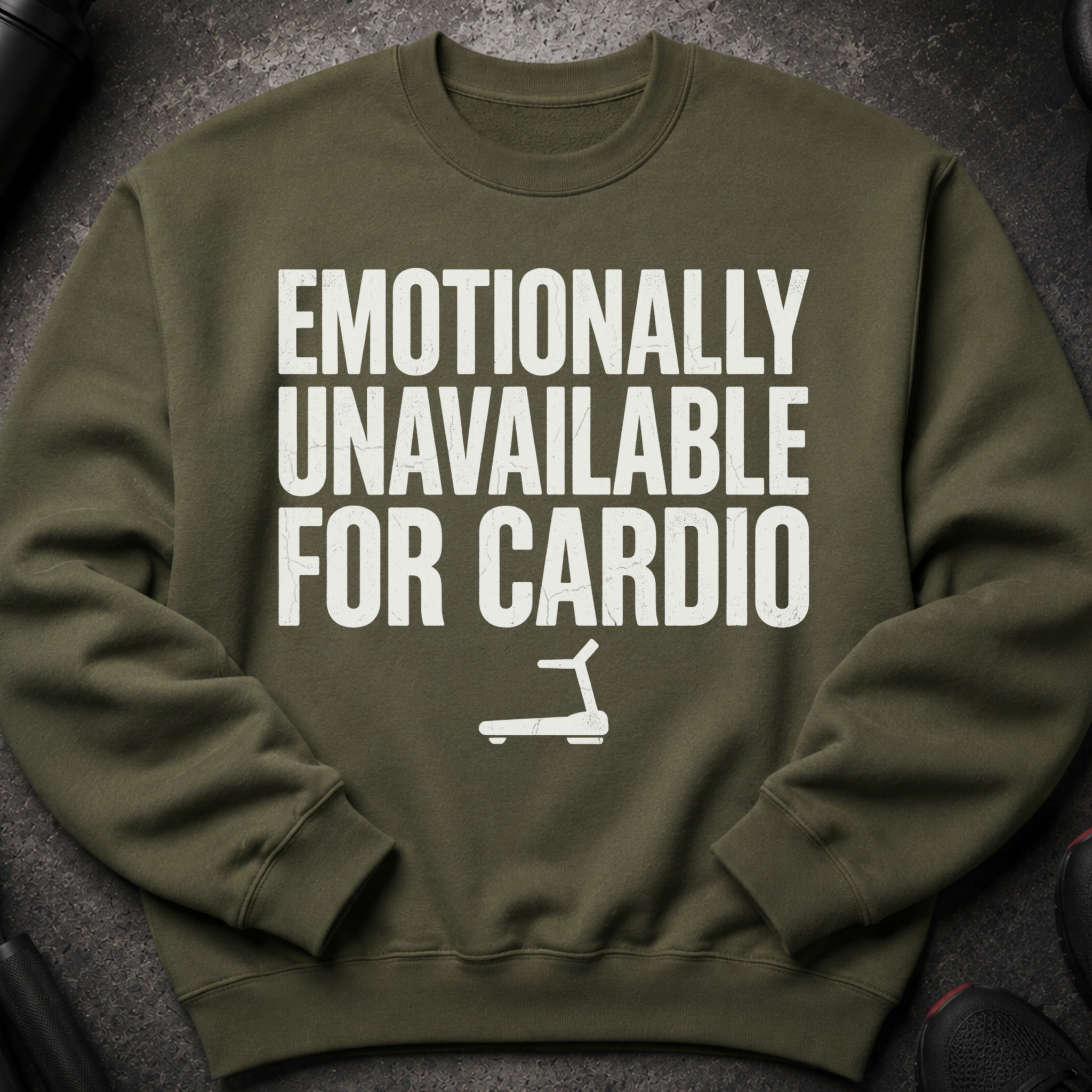Olive green sweatshirt with "EMOTIONALLY UNAVAILABLE FOR CARDIO" text and a treadmill icon.