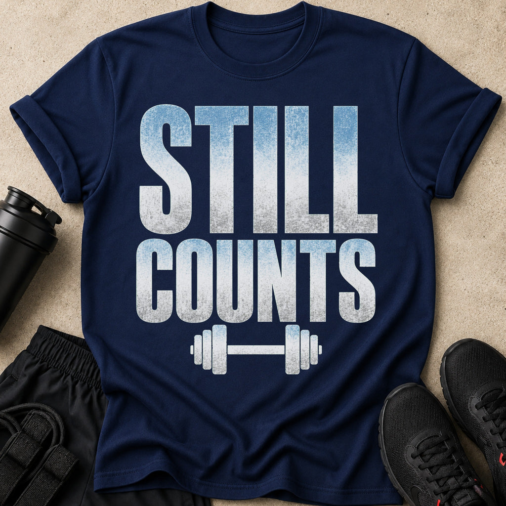 Navy t-shirt with "STILL COUNTS" text and barbell graphic.