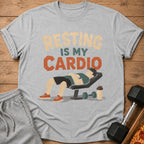 Grey t-shirt with "Resting is my Cardio" text and graphic of person on weight bench.