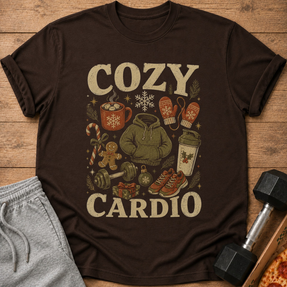 Brown t-shirt with "COZY CARDIO" text and holiday fitness graphics.