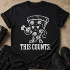 Black t-shirt with distressed white graphic of a pizza slice lifting a dumbbell and text "THIS COUNTS".