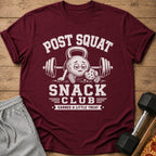 Maroon t-shirt with distressed graphic: "POST SQUAT SNACK CLUB EARNED A LITTLE TREAT"