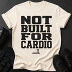 Cream t-shirt with black text "NOT BUILT FOR CARDIO" and treadmill graphic.