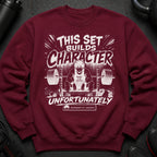 Maroon sweatshirt with white text and anime-style illustration of a man squatting with a barbell.