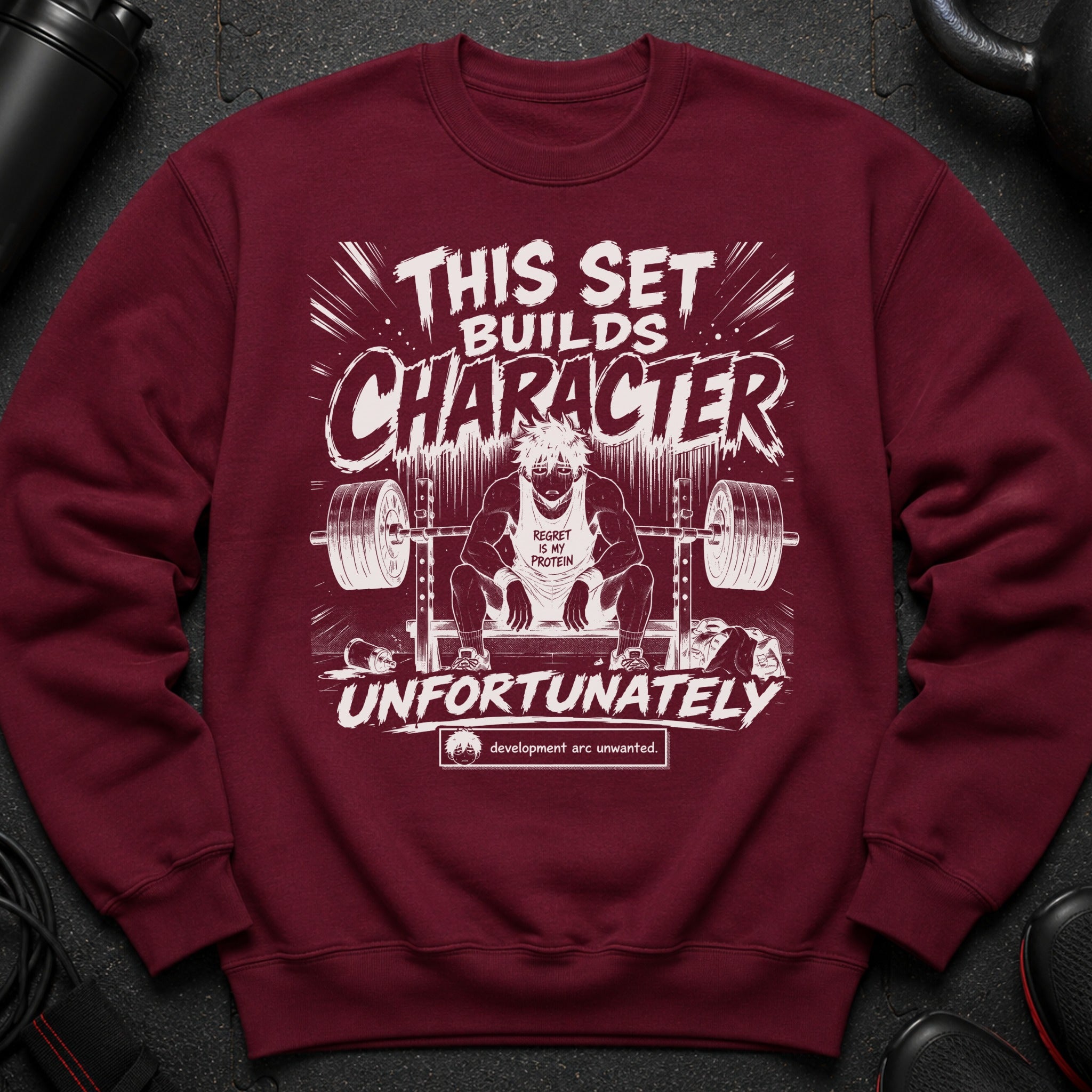Maroon sweatshirt with white text and anime-style illustration of a man squatting with a barbell.