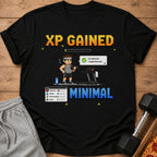 Black t-shirt with pixel art of a person on a treadmill and "XP GAINED" text.