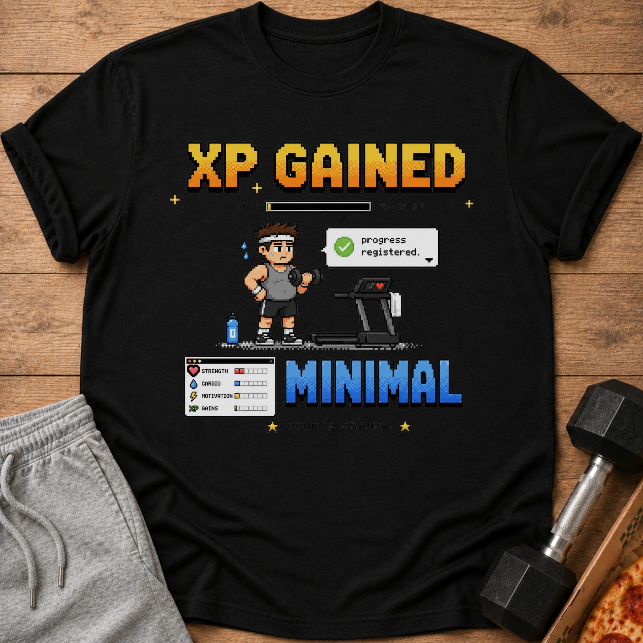 Black t-shirt with pixel art of a person on a treadmill and "XP GAINED" text.