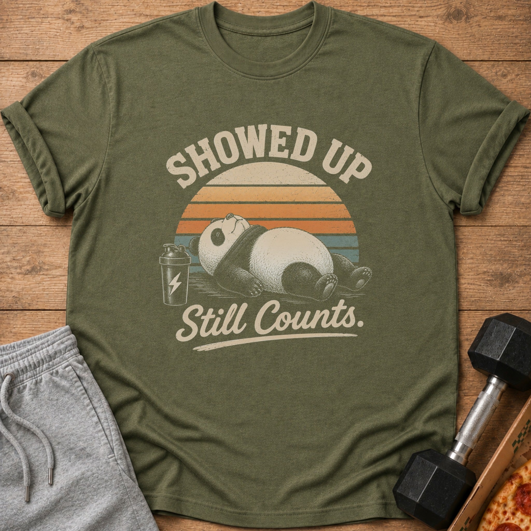 T-shirt with a sleepy panda and text "Showed Up Still Counts."