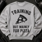 Grey sweatshirt with "TRAINING BUT MAINLY FOR PIZZA" text and pizza slice graphic.