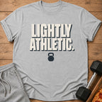 Grey t-shirt with "Lightly Athletic" text and kettlebell graphic.