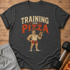 Dark gray t-shirt with "TRAINING FOR PIZZA" text and muscular cartoon man holding pizza.