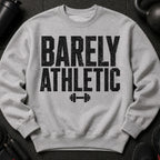 Grey crewneck sweatshirt with "BARELY ATHLETIC" text and dumbbell graphic.