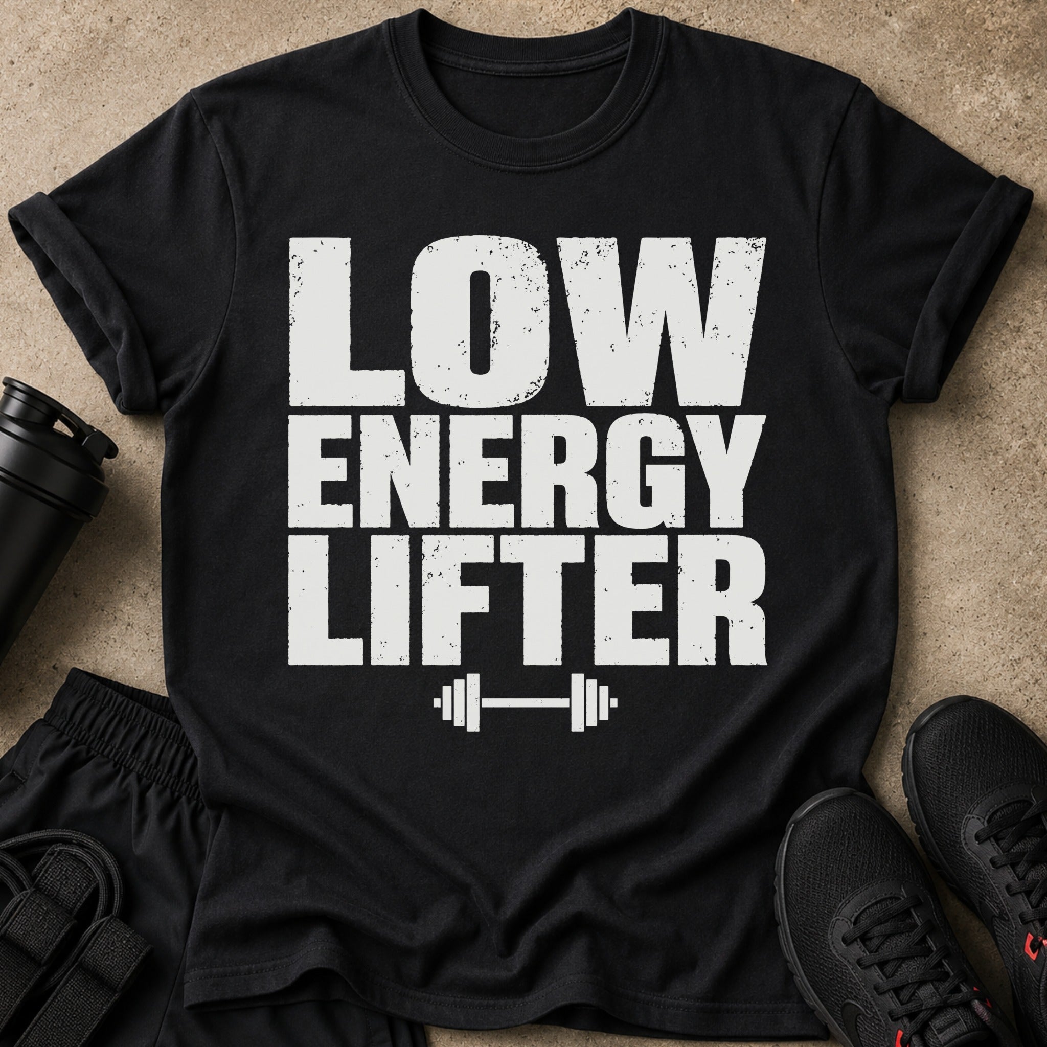 Black t-shirt with distressed white text "LOW ENERGY LIFTER" and a barbell graphic.